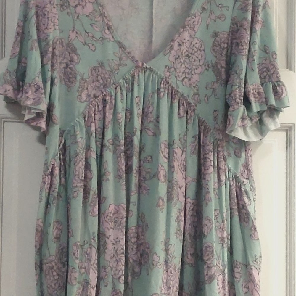 Ruffle sleeve trim short sleeve tonic.